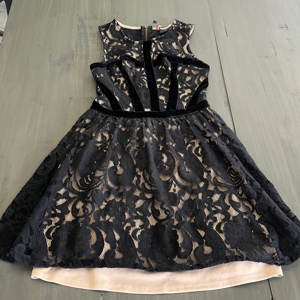 Perfect party dress. Black [lace] with tan under. Short